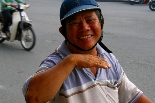 Vietnamese man op brommer